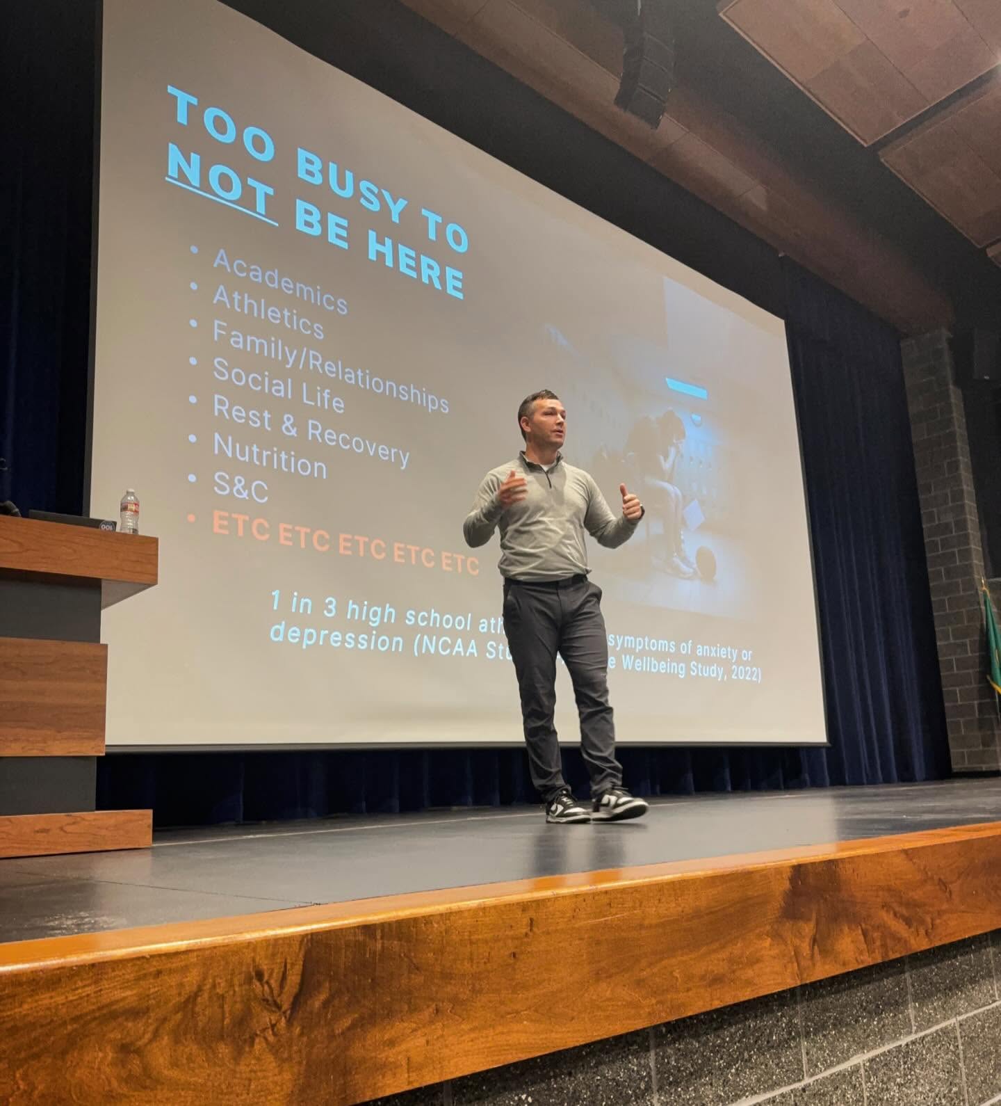Paul Swanson speaking to student athletes about performance and wellbeing